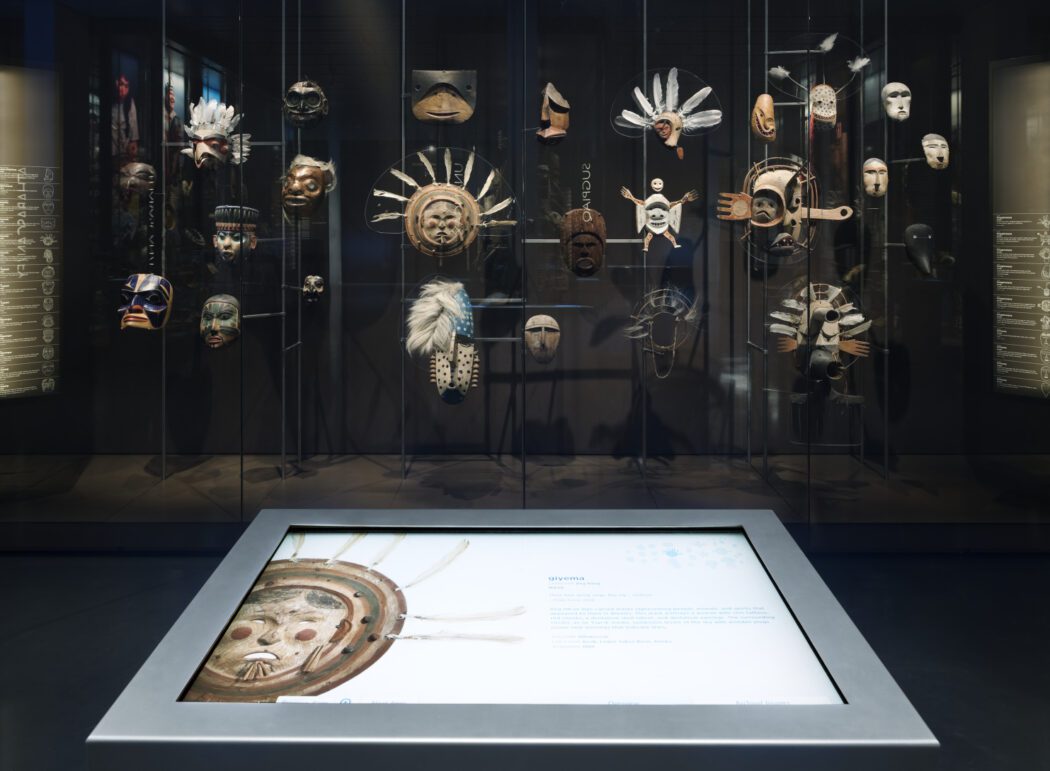 A museum exhibit of masks from Sugpiaq and other Alaska Native cultures
