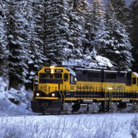 Travel by train in winter, a relaxing way to see Alaska.