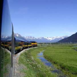 Scenic journey by train on the Alaska Railroad.