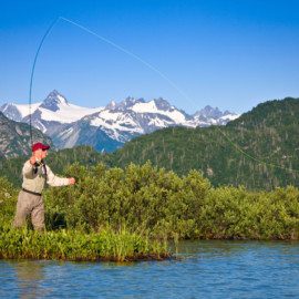 Fly-fishing for salmon on Big River Lakes from Redoubt Bay Lodge.
