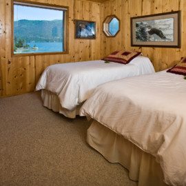Tutka Bay Wilderness Lodge luxurious bedding.