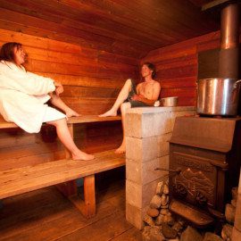 Tutka Bay Wilderness Lodge offers luxurious amenities including a wood fired sauna.