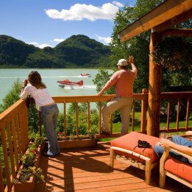 Guests on the deck at Redoubt Bay Lodge.