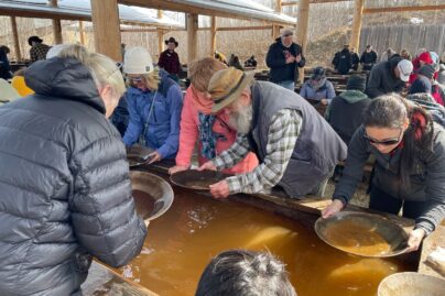 a group of people learning how to pan for gold