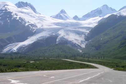 The paved Richardson Highway running past the alpine Worthington Glacier