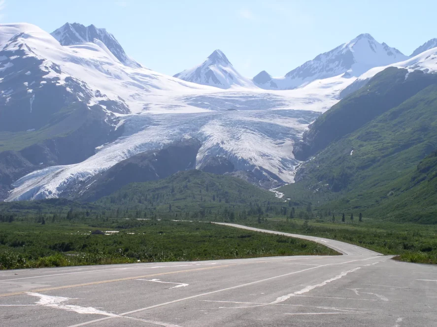 The paved Richardson Highway running past the alpine Worthington Glacier