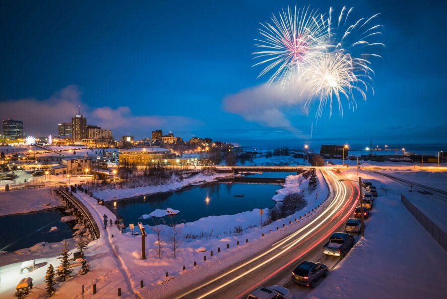 Fireworks illuminate the skies over downtown and Ship Creek, marking the start of Anchorage Fur Rendezvous, Anchorage's winter festival.